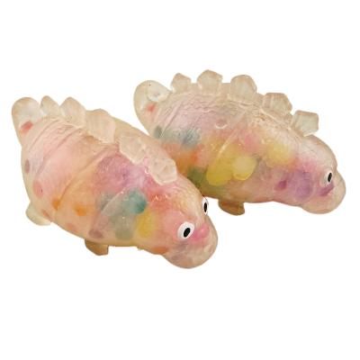 China Funny Anxiety Relife Toy Hot Sales Colorful Funny Squeezable Stress Dinosaur Spongy Ball Toys For Kids for sale