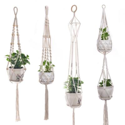 China Creative Creative Hemp Rope Pocket Wall Hanging Net Basket Flower Cotton Home Furnishing Hanging Basket for sale