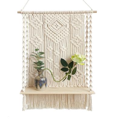 China 100% Handmade Bohemian Handwoven INS Flower Stand Tassel Tapestry Decoration Wall Hanging Shelves for sale