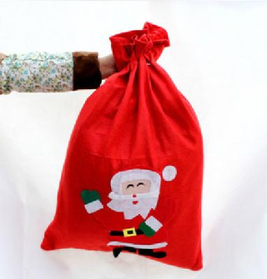 China Custom Christmas Applique Fabric Santa Backpack Non-woven Gift Bag Handmade Gift Bag for sale