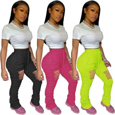 China Hot Selling Custom Made Ladies Viable High Out Of Wear Club Solid Color Bell Bottoms Sexy Waist Wrinkle Hollow Plus Size Women Legging Rocket Pants for sale