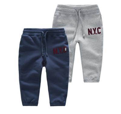 China Anti-pilling Wholesale Cheap Kids Clothing Sports Long Pants Pants From China for sale