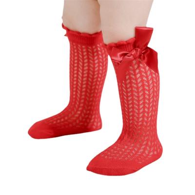 China Summer antibacterial baby bangs with arc hot Spanish Ins style hollow out thin knee high infant Princess Dress Socks for sale