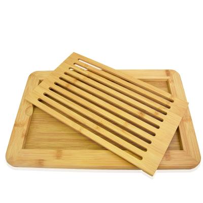 China Sustainable Environmental Multi-functional Practical Kitchen Bamboo Bread Cutting Chopping Board for sale