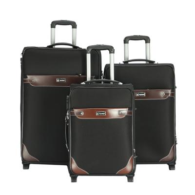 China Travel Business Storage Premium Grid Fabric Shell Spinner 4 Wheels 360 Degree 4pcs Soft Trolley Luggage Set for sale