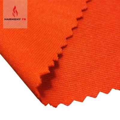 China CSA-Z96 Flame Retardant Modacrylic Viscose Knitted Orange Inherent Interlock FR Fabric for sale