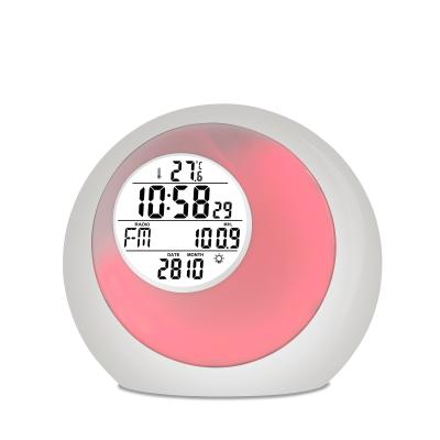 China Calendars Multifunctional FM Radio Desktop Alarm Clock with 7 Colors Control Light for sale