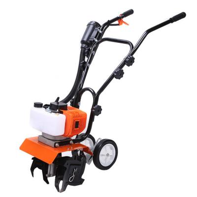 China Garment shops handle agriculture rotary mini tiller two or four stroke mini cultivator for sale