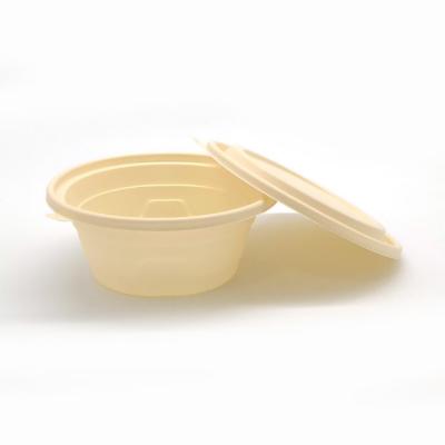 China Free Sample 800ml Minimalist Round Cornstarch Plastic Packaging Lunch Box for sale