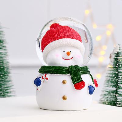 China Custom Cheap Christmas Deoration Christmas Snow Globe Resin Glass Christmas Lantern Snow Globe With Blowing Snow for sale