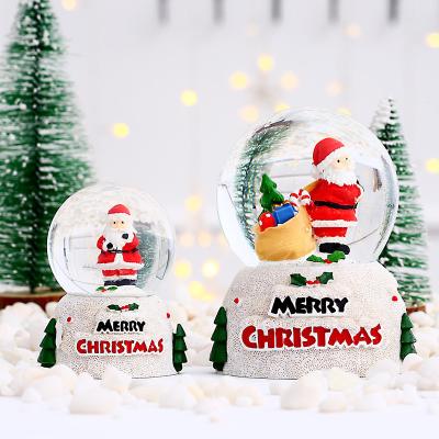 China Best Selling Crystal Ball Led Music Christmas Snowflake Resin Christmas Deoration Creative Glass Ball Crystal Ornament for sale