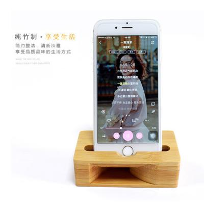 China Show video information manufacturer supplies wooden loudspeakers_ solid wood cell phone holder for lazy people for sale