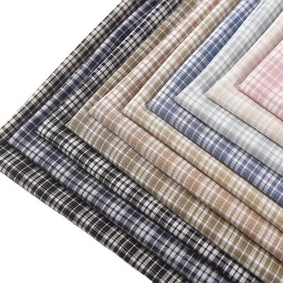 China Hot Selling New Breathable Plaid Shirts Stock Suits Elastic Woven Check Casual Fabric Yarn Dyed Fabric For Spandex Dress Pants for sale