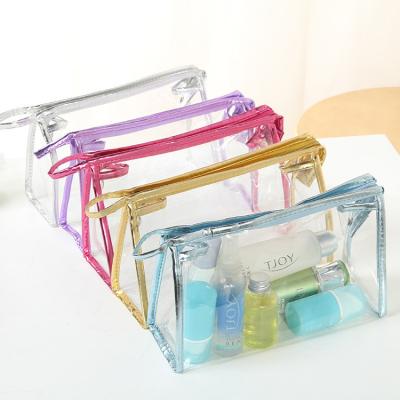 China Wholesale Stock PVC Cosmetic Bags Eco-friendly Washing Clear Transparent PVC Travel Clutch Bag Makeup Pouches Beauty Cosmetic Bags for sale