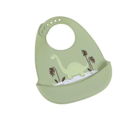 China Waterproof Bib Children's Waterproof Silicone Saliva Cartoon Dinosaur Adjustable Bib For Toddlers for sale