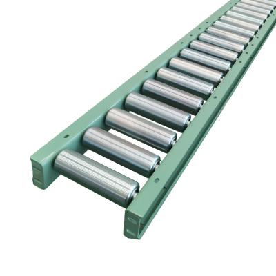 China Heavy Duty Oil, Food and Beverage Gravity Paddle Roller Conveyor Plant Factory Carbon Steel Spare Parts Oil Heavy Duty White Supplied for sale