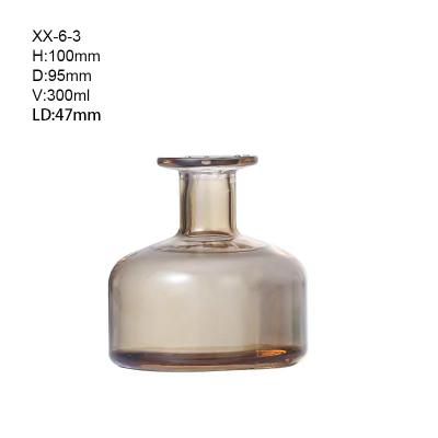 China Interesting 300ml Scents Stick Flameless Colored Tapered Horn Diffuser Glass Aromatherapy Bottle for sale