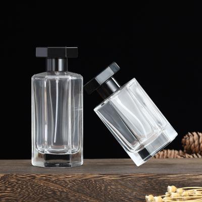 China 30ml 50ml 100ml Hexagon Cosmetic Luxury Empty Glass Perfume Bottles With Lid for sale