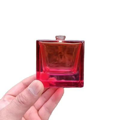 China 100ml Empty Cosmetic Matt Black Cube Perfume Bottles With Wooden Cap Custom Gradient Color Perfume Bottle for sale