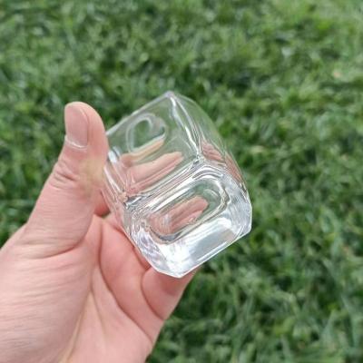 China High Quality Cosmetic Glass Spray 100ml Empty Crystal Mini Perfume Bottle For Women With Resin Cap for sale