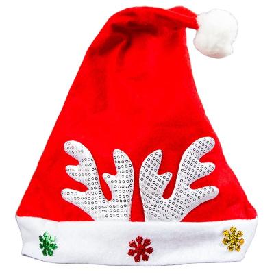 China 2021 Cheap Non Woven Polyester Fiber Christmas Hat With Colorful Decoration Sequined Red Hat Antler Stage Supply And Decoration for sale