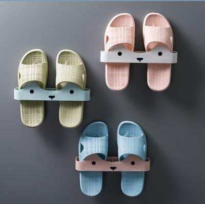 China Wholesale Plastic Corner Space Saver Bathroom Shoe Rack Wall Mounted Slippers Stretch Slippers Rack Rack for sale