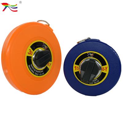 China Pakistan Smooth Retractable Hot Selling Rebounding Bunny Fiberglass Measuring Tape 15m/50ft 30m/100ft for sale