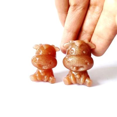 China Europe New Product Natural Crystal Carving Sun Stone Craft Animal Carving Crystal Cow at Sun Crystal Stone for sale