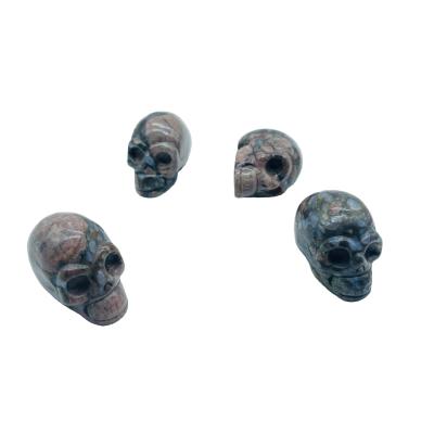 China Europe Gemstone Wholesale Skulls High Quality Hollow Cut Crystal Skulls Healing Crystal Skulls for sale