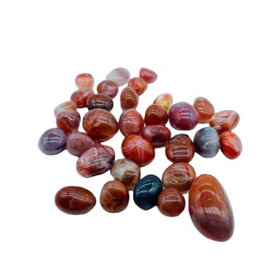 China Natural Polished Red Europe Agate Sardonyx Tumble Stone Healing Tumbled Stone For Sale for sale