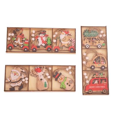 China Sinyoo Wooden Christmas Tree Printed Wooden Hanging Ornaments For Christmas Home Decoration 9PCS A Set for sale