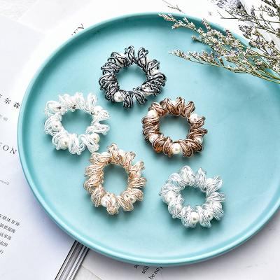 China Popular Personalized Elastic Traceless Hair Bands Women Fashion Solid Colors Pearl Phone Rope Ponytail Holders Custom Hair Ties for sale