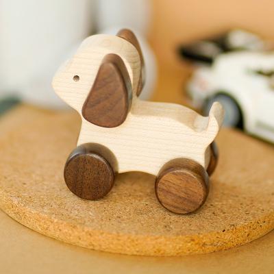 China Eco-Freindly European and American Log Used Toys Dogs Folk Toy Handmade Solid Wood Early Education Toy for Babies for sale