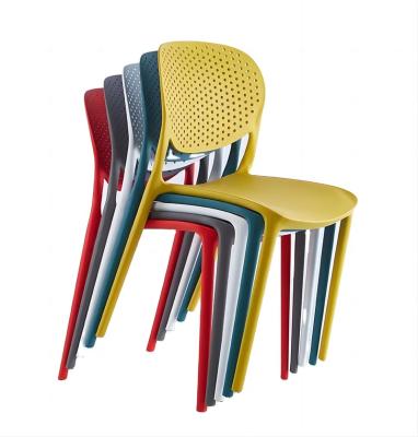 China Famous Design Adjustable Free Sample Stackable Outdoor Breathable Garden Chair (Other) Hollow Colors Plastic Dining Chairs for sale