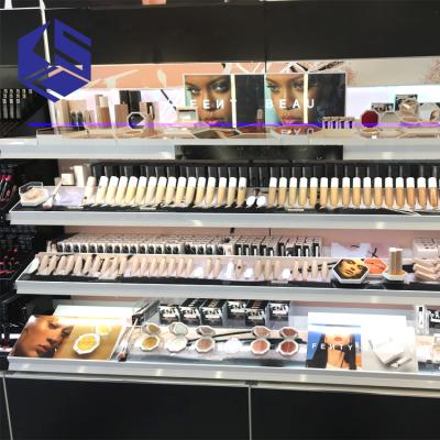 China Modern Make Up Cosmetic Store Decoration Showcase Display Rack For Sale for sale