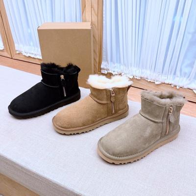 China Round Fashion Mini Cute Outdoor Furry Sheepskin Ladies Winter Ankle Warm Comfortable Snow Boots For Women for sale