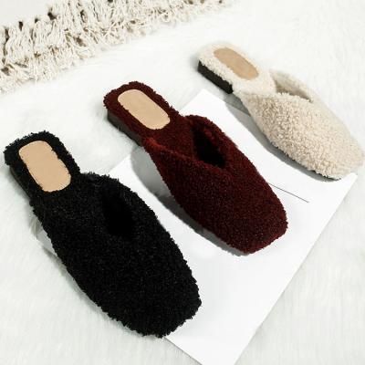 China Custom Warm Comfortable Closed Toe Slides Fuzzy Soft House Fashion Trend Winter Lamb Fur Fluffy Slippers For Women for sale