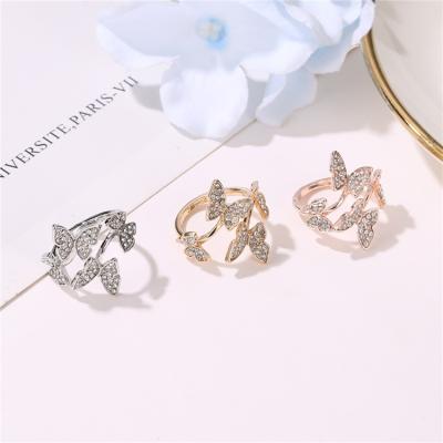 China Environmental Friendly High Quality Four Butterfly Open With Diamonds Luxury Butterfly Rings For Women Custom Ring for sale