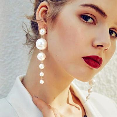 China Free Sample Luxury Fashionable Elegant Big String Long Dangle Tassel Simulated Pearls Earrings For Women for sale