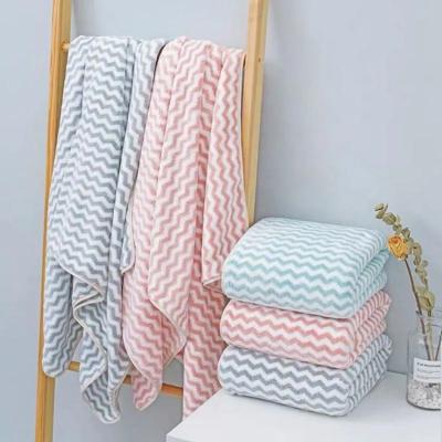 China Wholesale QUICK DRY Terry Bathing Towel Cloth Spa Bath Wrap Towels Luxury Coral Fleece Bath Towel for sale