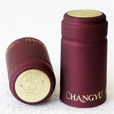 China Pilfer Red PVC Heat Shrink Proof Custom Disposable Wine Caps For Liquor Wine Liquor Cap Sealing for sale