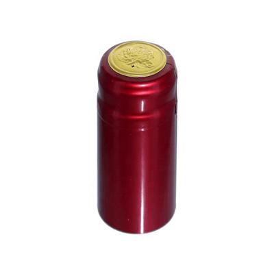 China Custom Logo Champagne PVC Heat Shrink Wine Bottle Pilfer Proof Embossed Shrink Cap Cap Sleeve for sale