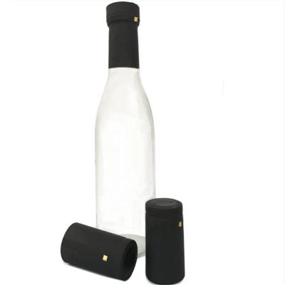 China Pilfer Proof Custom Wine Bottle Shrink Caps Wholesale Heat Shrink Caps Sleeves 30*60mm Wine PVC Shrink Cap for sale