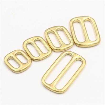 China Metal Bag Various Sizes Metal Buckles High Quality Solid Brass Material Tri Slip Buckle For Leather Bags for sale