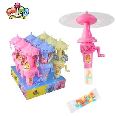 China Cartoon Toys Perfect As Kids Hand Crank Operated Carousel Toy Candy With Light Glowing Gifts Girl for sale