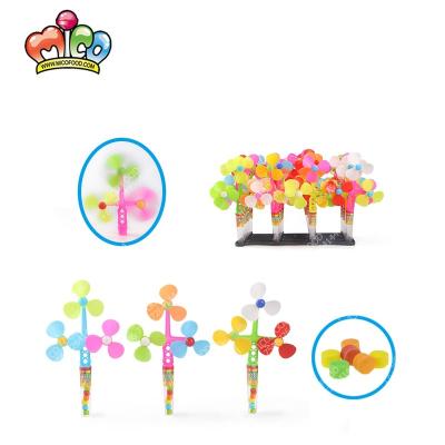 China Full Size Cartoon Colorful Windmill Tube Toy Candy For Kids for sale