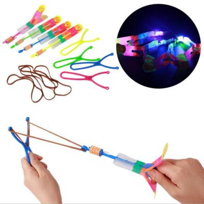 China Flight Toy Elastic Small Blade Y Led Flight Helicopter Slingshot Rocket Toys for sale