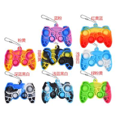 China Mini durable silicone gamepad push bubble toy with key chain for sale