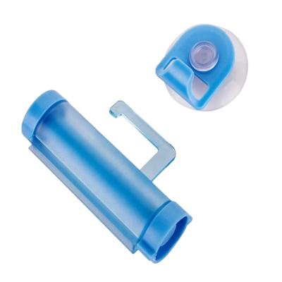 China Sustainable Plastic Toothpaste Rolling Tube Squeezer Dispenser for sale