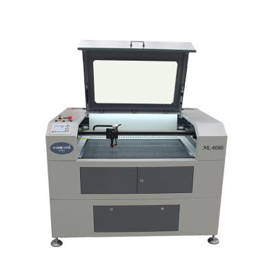 China LASER CUTTER Best Selling Laser Engraving and Cutting Machine CNC Laser Cutting Machine for Rubber for sale